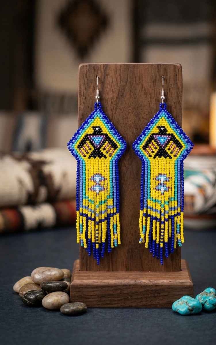 Beaded thunderbird earrings yellow / purple