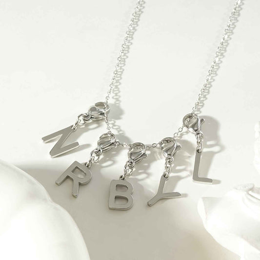 SOLID LETTER MINI CHARMS A–Z in SILVER (White Gold): Dainty Initial Alphabet Pendant for Necklaces & Bracelets — $12.50